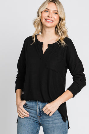 Long sleeve pocket hi low knit black top