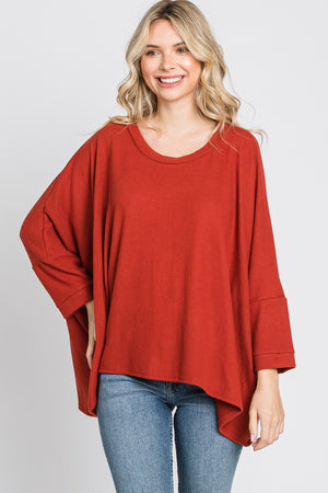 Scoop neck dolman sleeve sweater knit rust top